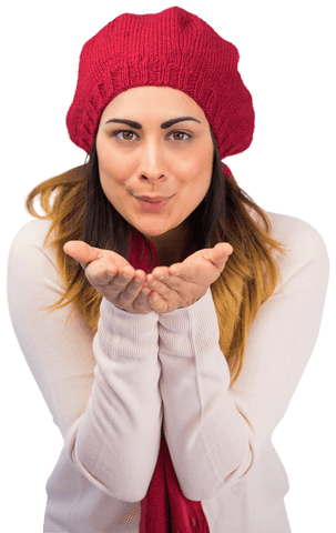 Smiling woman in red hat blowing a kiss isolated on transparent