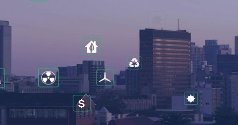 Twilight city skyline showing renewable energy and smart city technology icons