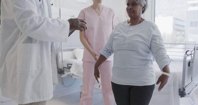 Senior Woman Receiving Physical Therapy from Doctor and Nurse in Hospital Room - Download Free Stock Images Pikwizard.com