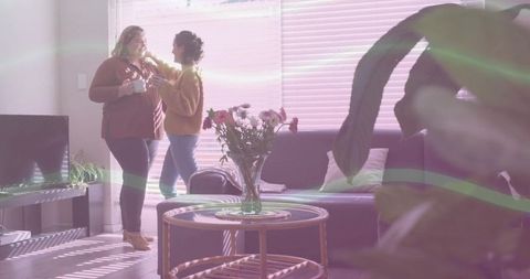 Cozy Living Room Scene with Friends Sharing Coffee