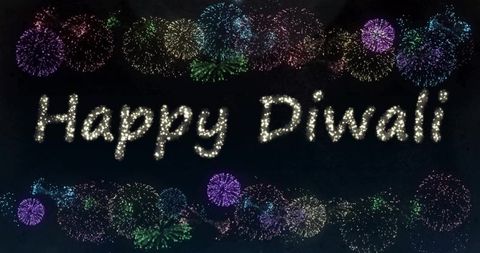 Glowing happy diwali sparkler script with colorful fireworks celebrating festival night