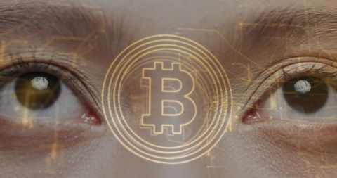 Asian woman gazing through gold bitcoin ring overlay, futuristic crypto closeup portrait