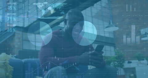 Businessman Amidst Financial Data Graphics