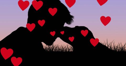 Silhouette of Boy and Dog Sharing a Heartfelt Moment