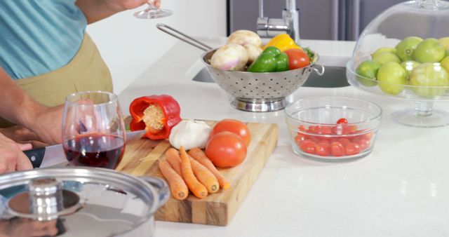 Fresh Vegetables Preparing in Modern Kitchen with Wine - Download Free Stock Images Pikwizard.com