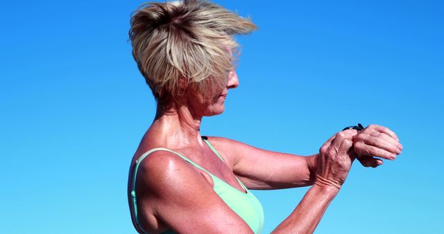 Senior Woman Checking Fitness Tracker in Outdoor Exercise - Download Free Stock Images Pikwizard.com