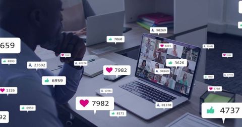 Remote conference engagement with live reaction badges on laptop at modern office desk