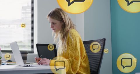 Caucasian Businesswoman Engaged in Social Media Data Analysis on Laptop