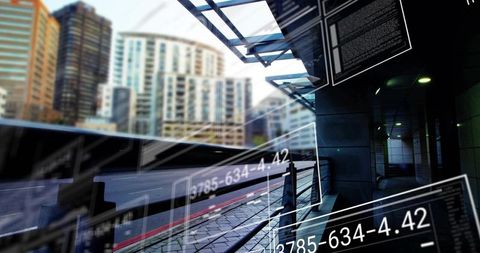 Urban walkway featuring augmented reality hud overlays under glass canopy near red curb