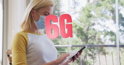 Woman cleaning smartphone illustrating future 6g technology