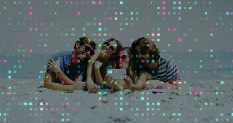 Group of Friends Relaxing and Taking Selfie on Sunny Beach