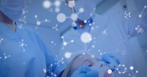 Dental team examining patient with molecular overlay representing oral microbiome study