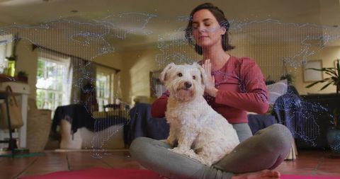 Woman Practicing Mindfulness Yoga with Dog in Cozy Living Room