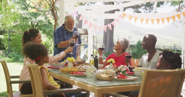 Diverse Family Enjoying Sunny Backyard Dining Experience - Download Free Stock Images Pikwizard.com