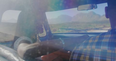 Joyful Couple on Sunny Road Trip Through Scenic Landscape - Download Free Stock Images Pikwizard.com