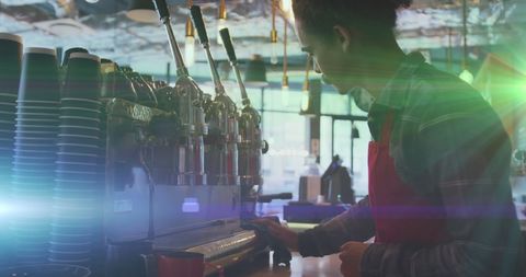 Barista skillfully preparing espresso in artisan coffee shop