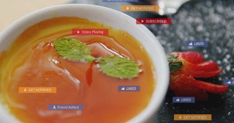 Refreshing mint tea floating in white cup with strawberry and social media notifications