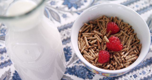 Healthy Breakfast with Milk and Bran Cereal with Raspberries - Download Free Stock Images Pikwizard.com