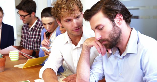 Multi-Ethnic Coworkers Collaborating on Project in Modern Office - Download Free Stock Images Pikwizard.com