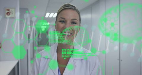 Smiling Doctor with Holographic Medical Data in Modern Corridor - Download Free Stock Images Pikwizard.com