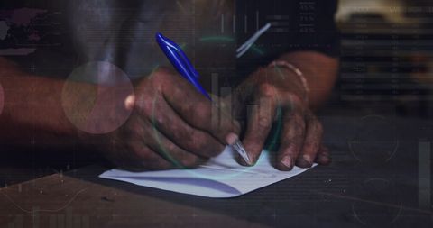 Man Writing Notes with Overlay of Data Graphics - Download Free Stock Images Pikwizard.com