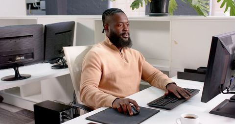 Confident African American Professional Attending Virtual Meeting in Office