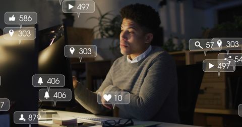 Biracial Businessman Analyzing Social Media Engagement Metrics