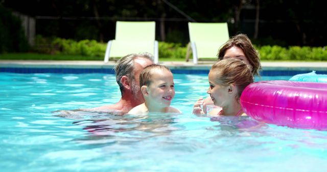 Happy Family Enjoying Summer Swim in Pool - Download Free Stock Images Pikwizard.com