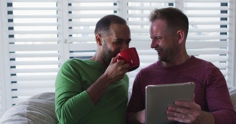 Diverse Gay Couple Enjoying Relaxed Home Time