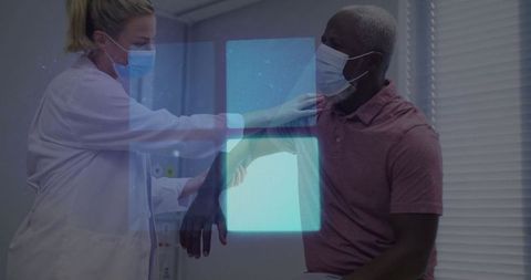 Healthcare innovation: doctor examining patient with digital interface