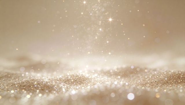 Golden glitter texture with soft bokeh and warm light for luxury holiday backgrounds
