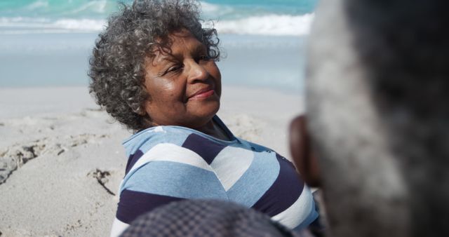 Senior Woman Enjoying Relaxing Day on Seashore with Husband - Download Free Stock Images Pikwizard.com