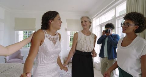 Bride with Friends in Wedding Preparation Joy