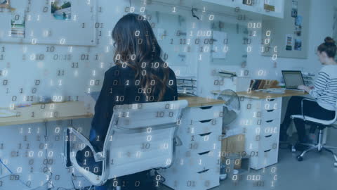 Women Working in Office with Digital Data Overlay