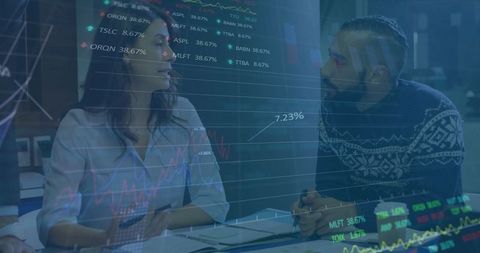 diverse professionals analyzing digital stock data in modern office - Download Free Stock Images Pikwizard.com