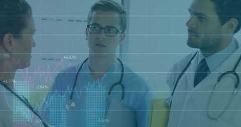 Healthcare team analyzing performance metrics in hospital setting