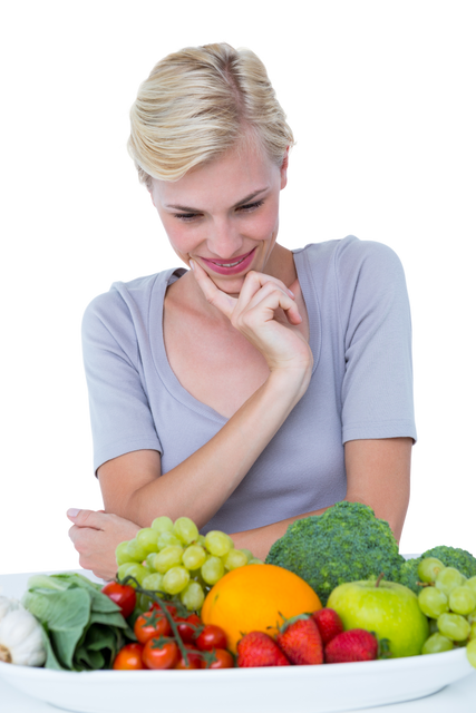 Happy blonde woman with transparent background sitting above healthy food selection - Download Free Stock Videos Pikwizard.com