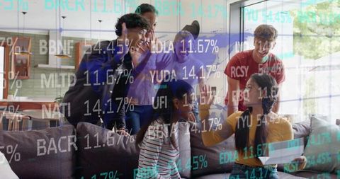 Young Friends Watching Stocks on Laptop in Bright Modern Living Room