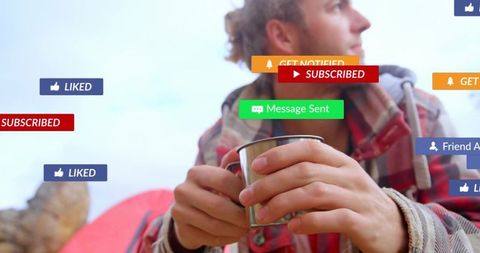 Camper holding metal mug while looking away with social media notification overlays