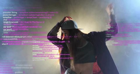 Futuristic dancer performing with projected digital code overlay