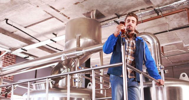 Brewery Worker Inspecting Beer Quality in Brewery Plant - Download Free Stock Images Pikwizard.com