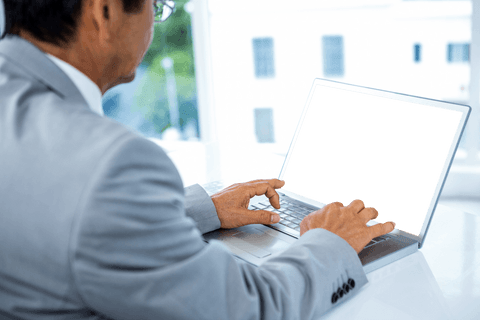 Businessman Working on Laptop with Transparent Screen - Download Free Stock Videos Pikwizard.com