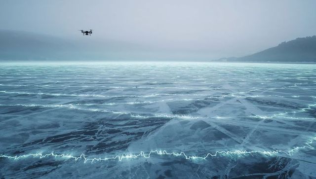 Hovering drone over glowing cracked frozen lake stretching to misty horizon