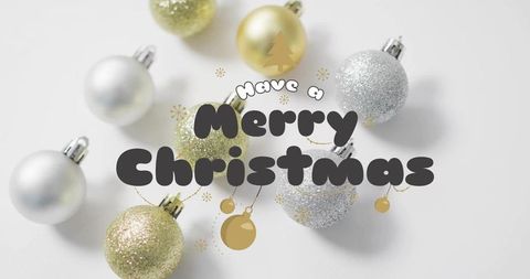 Gold and silver christmas baubles merry christmas typography white minimalist background