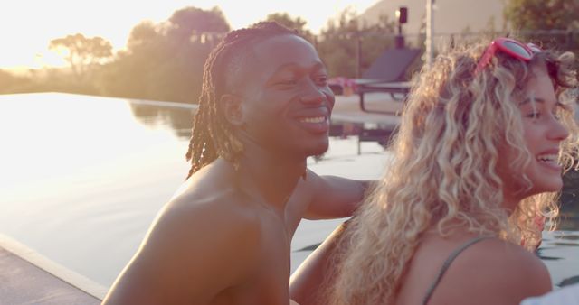 Happy Couple Relaxing by Pool at Sunset - Download Free Stock Images Pikwizard.com