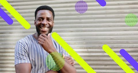 Smiling Man with Neon Graphic Elements Urban Background