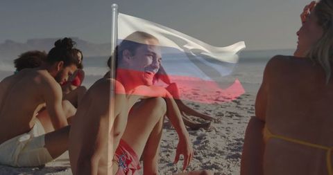 Friends enjoying beach day with overlayed tricolor flag