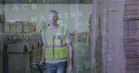 warehouse worker with high-visibility vest navigating logistics area - Download Free Stock Images Pikwizard.com