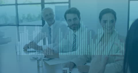 Business Team Meeting with Financial Data Overlays