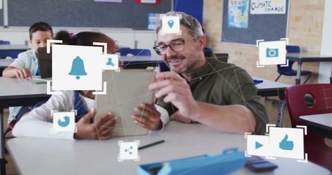 Teacher and student engaged in digital learning with technology